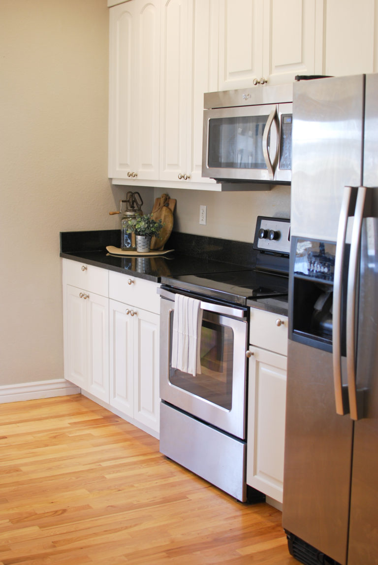 Kitchen Update: paint cabinets white – Emily's Project List
